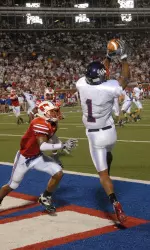 Senior Aaron Rhea hauls in six passes for 66 yards and a score Saturday in Hammond.