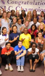 SFA celebrates conference track and field title.