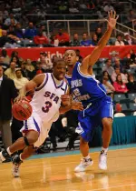 This is a photo of Eddie Williams doing something I would never allow, if he would ever take me up on my one-on-one challenge. The baseline is my turf.