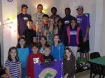 SFA players with students from Charter Elementary School that participated in Home Runs Readers.