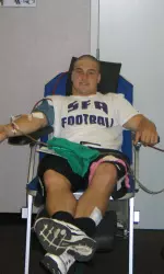All-SLC linebacker Devin Ducote takes part in blood drive.