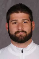 Adam Wolfe sets school record in the javelin throw.