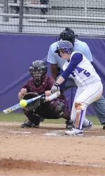 Charlotte Singleton records her first career home run Saturday.