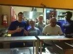 SFA'S SAAC representatives prepare and serve chili at GODTEL Ministries Monday evening.