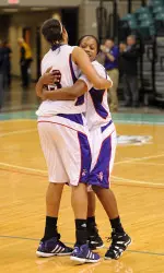 Seniors Tammara Marion and Amina Sawyer embrace following SFA's 66-57 victory over Nicholls State Thursday.