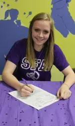 Melanie Crawford signs her letter of intent with Stephen F. Austin.