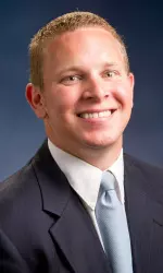Director of Media Relations Rand Champion