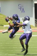 Marvin Gray records one of his two interceptions Saturday.