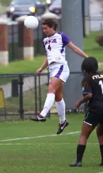 Rachel Owens goes up for a header in a spring match at TJC.