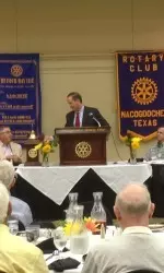 Texans' President Jamey Rootes speaks at Nacogdoches Rotary.