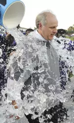 Head coach Clint Conque gets the ice water shower after SFA knocked off eighth-ranked Southeastern Louisiana Saturday