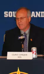 Head coach Clint Conque at the dais for 2014 SLC Media Day