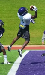 Senior Tyler Boyd hauls in a one-handed touchdown catch during SFA's morning practice session