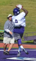 Senior DJ Ward pulls in a 20-yard touchdown strike during redzone drills