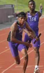 Teddy Hawkins (front) and Johnathan Joe helped SFA win the 4x400m relay on Friday night