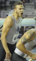 Kerry Gleason encouraging a 4x400m relay teammate at the SLC Indoor Championships last month