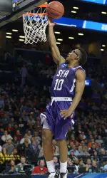 Trey Pinkney scores two of his five points in an NCAA Tournament second round game against Notre Dame.