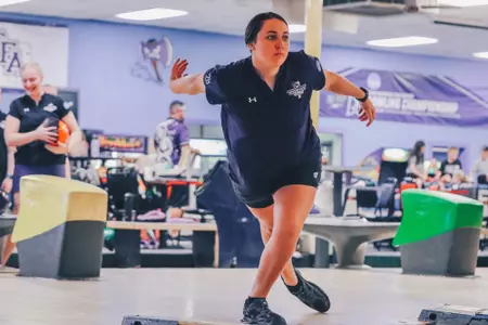 Hana completes her throw