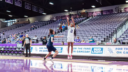 aziyah farrier shoots a three-pointer