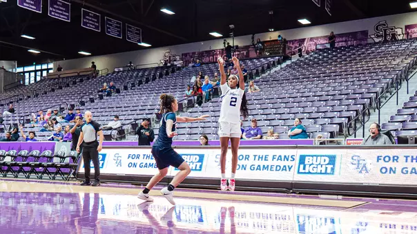 aziyah farrier shoots a three-pointer