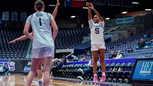 key roseby attempting a three-pointer