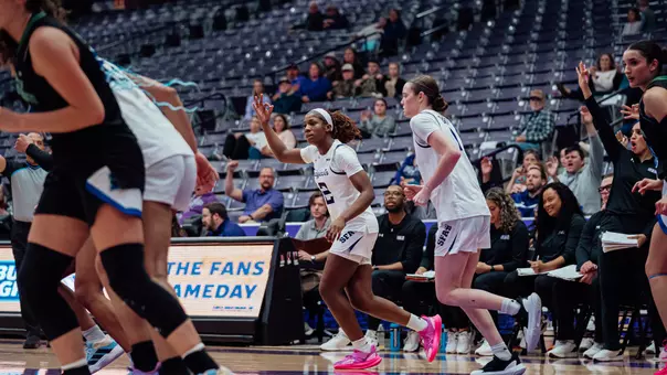 kaylinn kemp celebrating after a three-pointer