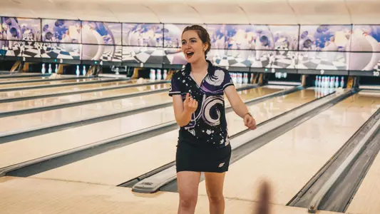 Frances Davila reacts to a strike.