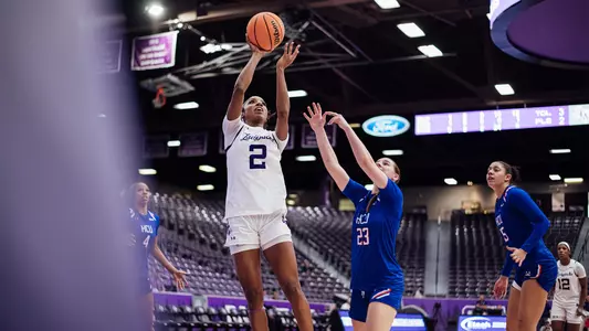 Aziyah Farrier going up for a layup vs HCU