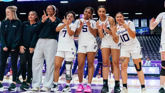 wbb team celebrating a home win