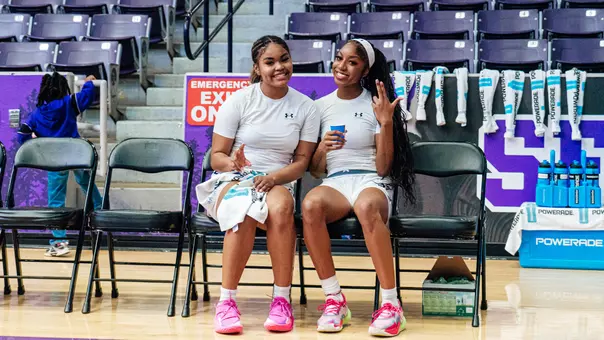 key roseby and aziyah farrier sitting next to each other