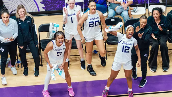 Key Roseby, Kaylinn Kemp, and Cha Gardner celebrating (2-19-26)