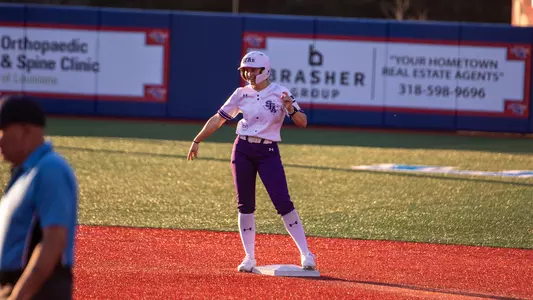 Kylie Bishop celebrating on second base at La Tech (2-27-26)
