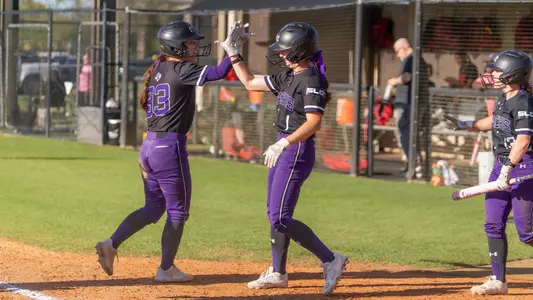 Ellie Vance and Kaylee Paul celebrating at Lamar