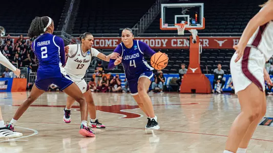 Ashlyn Traylor-Walker dribbling against Missouri State (3-18-26)