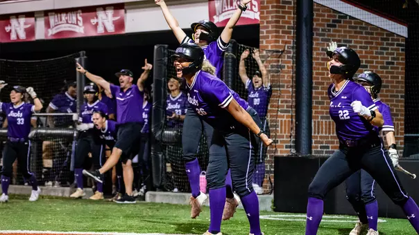 Ella Hill, Kylie Bishop, and Malia Jones celebrating Kaylee Paul's triple