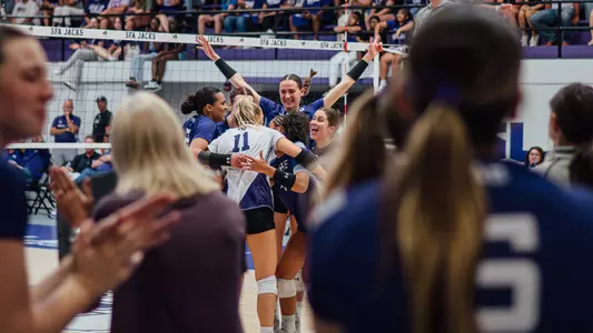 VB team celebrating after a point