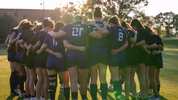SFA Soccer Team Huddle