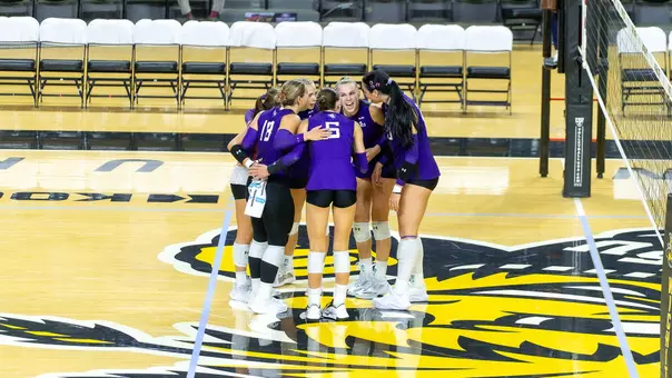 Volleyball Team celebrating after point