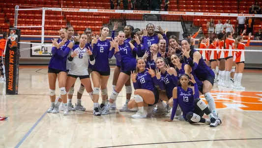 VB Team Celebrating Win at Sam Houston