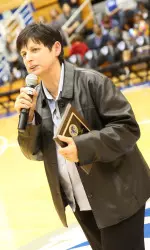 Former head coach Phyllis Mangina addresses the crowd at Friday night's 1993-94 team reunion.