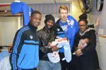 Sterling Gibbs & Patrik Auda visit with families at Saint Barnabas Medical Center