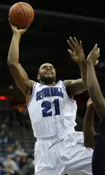 Center Eugene Teague led the Pirates Friday night with 18 points and 11 rebounds.