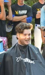 Adnan Pjetrovic waits for a trim.