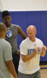 Head coach Kevin Willard working with freshman forward Angel Delgado