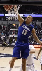 Haralds Karlis dunking in the second half at Xavier.