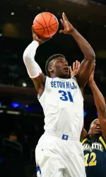 BIG EAST Rookie of the Year Angel Delgado reached the seven rebound mark for the 15th consecutive game in what was his conference tournament debut