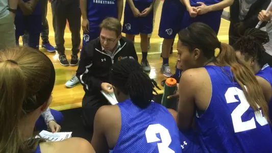 Team huddle Carleton