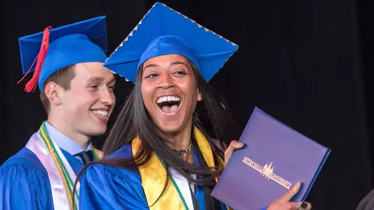 Desyre Blackburn receiving her diploma