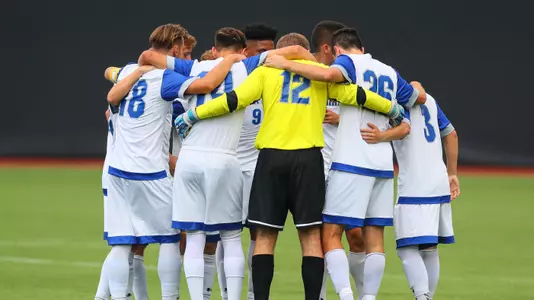 Men's Soccer Team huddle