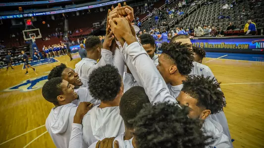 Men's Basketball Huddle Prior to UNH